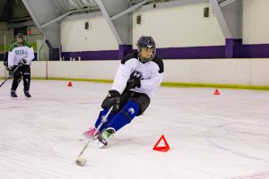 player curling around a cone