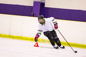 player curling around a cone